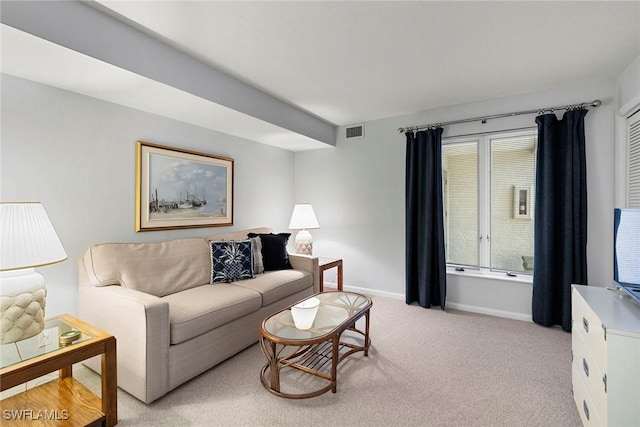 105 Wilderness Dr Unit B105, Naples, FL 34105 - living area featuring baseboards, visible vents, and light colored carpet