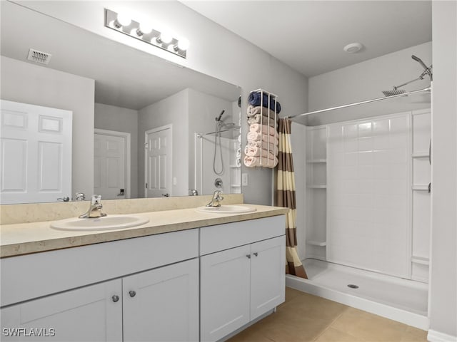 26480 Chaparel Dr, Bonita Springs, FL 34135 - bathroom with visible vents, a shower stall, and a sink