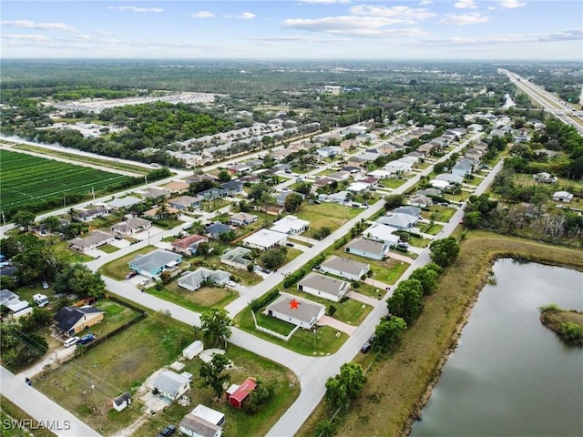 26480 Chaparel Dr, Bonita Springs, FL 34135 - drone / aerial view featuring a water view and a residential view