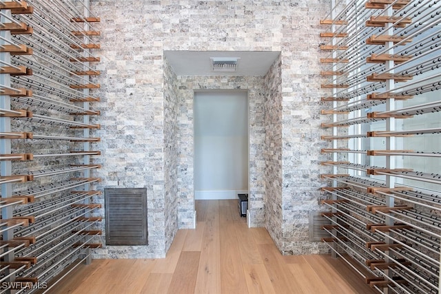188 W St, Naples, FL 34108 - unfurnished living room featuring wood finished floors