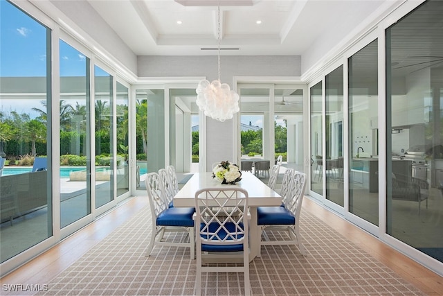 188 W St, Naples, FL 34108 - sunroom with coffered ceiling, a chandelier, and beam ceiling