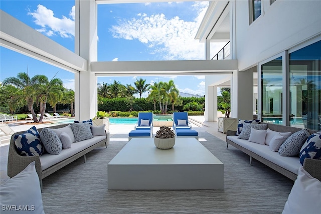 188 W St, Naples, FL 34108 - view of patio featuring outdoor lounge area and an outdoor pool