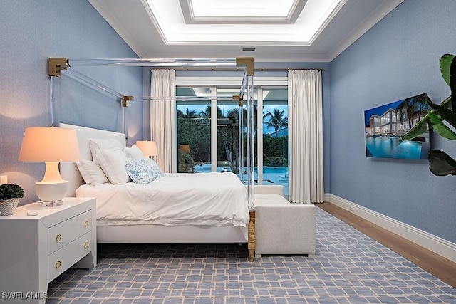 188 W St, Naples, FL 34108 - bedroom featuring wood finished floors, access to exterior, and baseboards