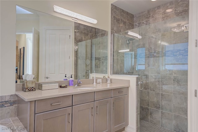 bathroom featuring a stall shower and vanity