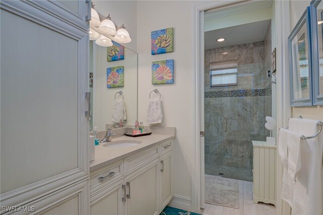 full bathroom featuring vanity, radiator, and a shower stall