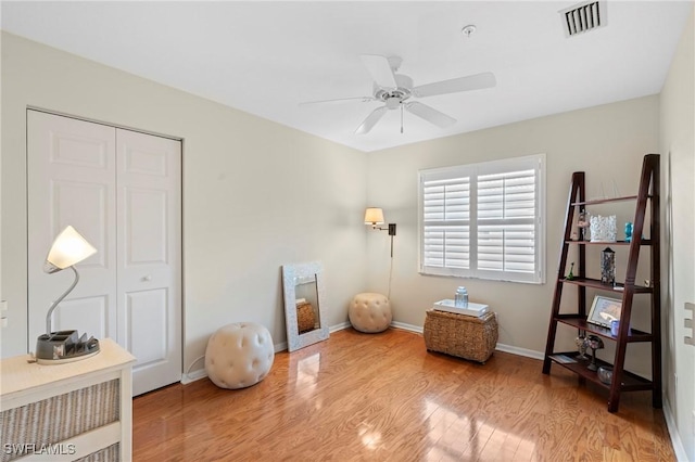 6660 Huntington Lakes Cir Unit 204, Naples, FL 34119 - miscellaneous room with baseboards, a ceiling fan, wood finished floors, and visible vents