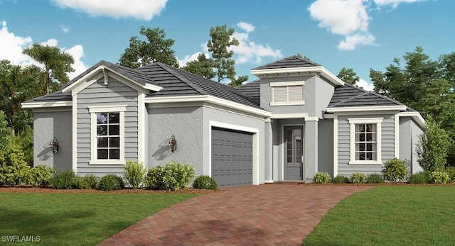 view of front of house featuring decorative driveway, a garage, a front lawn, and stucco siding