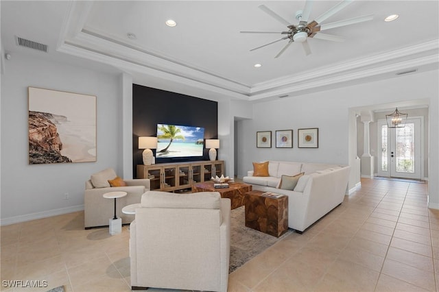 living area with visible vents, recessed lighting, a raised ceiling, and light tile patterned flooring