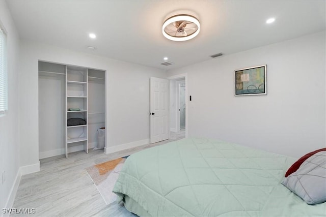 1115 Central Dr, Naples, FL 34104 - bedroom with light wood-style flooring, recessed lighting, baseboards, visible vents, and a closet