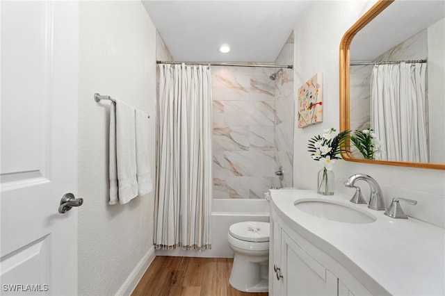 3565 Balboa Cir W, Naples, FL 34105 - full bathroom with vanity, shower / bath combination with curtain, toilet, baseboards, and wood finished floors