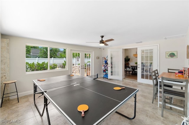3565 Balboa Cir W, Naples, FL 34105 - rec room with light tile patterned floors, a ceiling fan, french doors, and baseboards