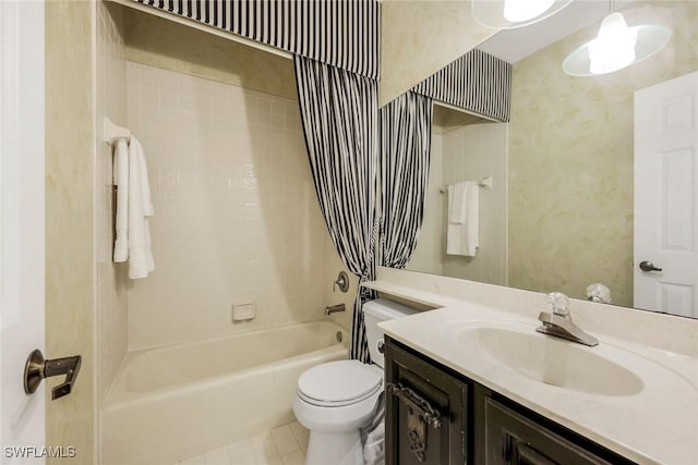 bathroom with vanity, tile patterned flooring, tub / shower combination, and toilet