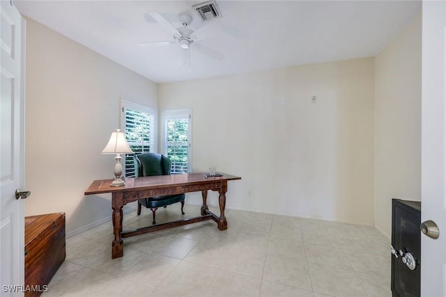 office with tile patterned floors, a ceiling fan, and visible vents
