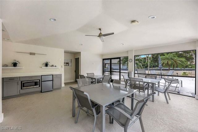 dining space with a ceiling fan and recessed lighting