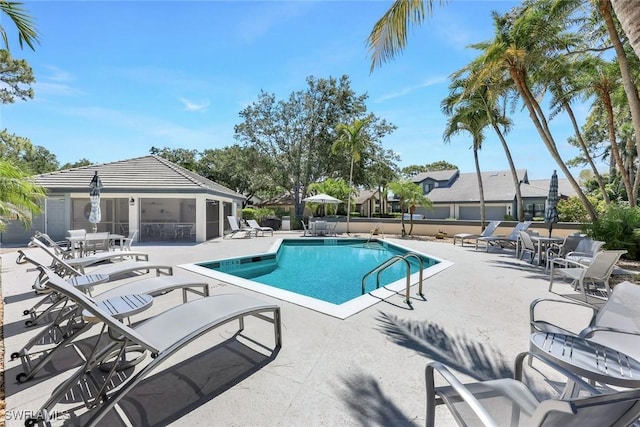 community pool featuring a patio