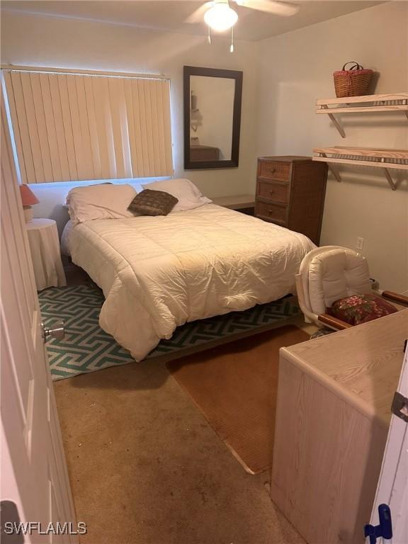 2385 Naples Trace Cir Unit 1, Naples, FL 34109 - carpeted bedroom featuring ceiling fan