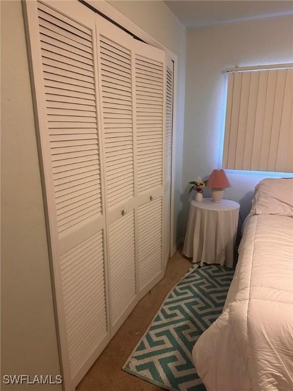 2385 Naples Trace Cir Unit 1, Naples, FL 34109 - bedroom featuring a closet