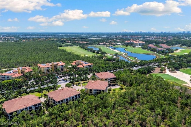 birds eye view of property featuring a water view and view of golf course