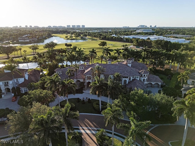 9663 Mashie Ct, Naples, FL 34108 - aerial view of property and surrounding area featuring a nearby body of water, a golf course, nearby urban area, and nearby suburban area