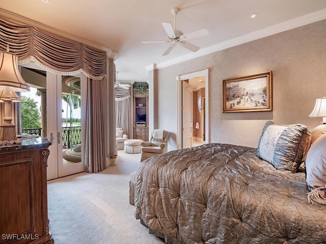 9663 Mashie Ct, Naples, FL 34108 - bedroom with light colored carpet, access to exterior, crown molding, and connected bathroom
