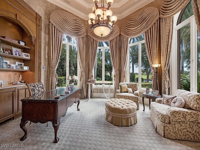 9663 Mashie Ct, Naples, FL 34108 - sunroom / solarium featuring crown molding, a towering ceiling, carpet floors, and a chandelier
