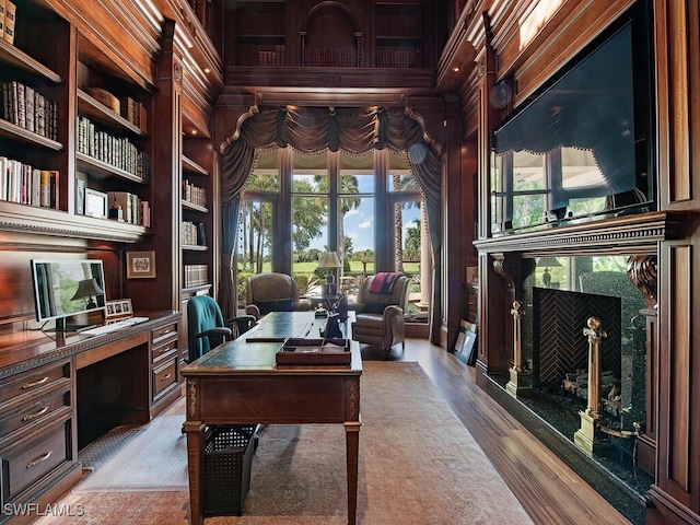 9663 Mashie Ct, Naples, FL 34108 - office featuring wood finished floors and wood walls