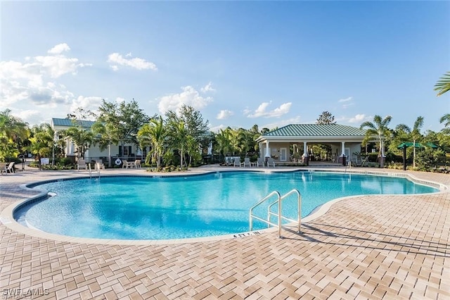 pool with a patio