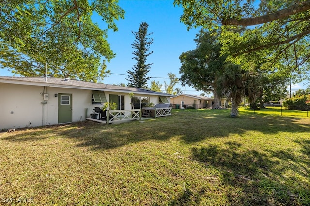view of yard featuring fence