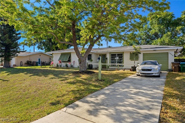 view of front of house with a garage, stucco siding, driveway, and a front yard