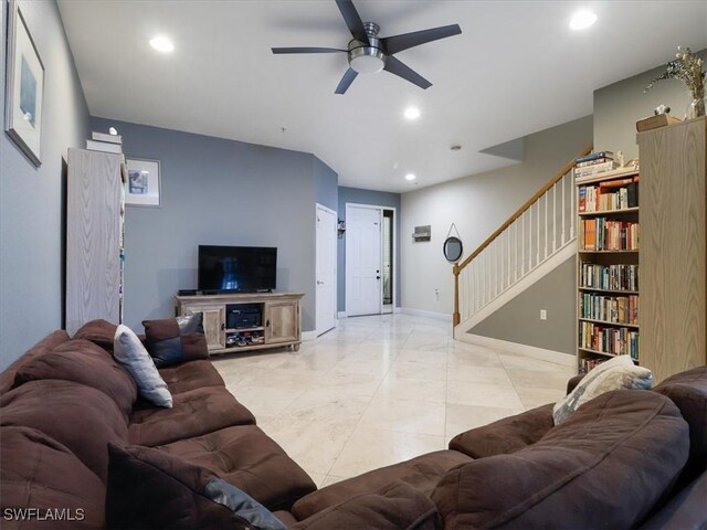 4371 Lazio Way Unit 707, Fort Myers, FL 33901 - living room with recessed lighting, stairs, ceiling fan, and baseboards
