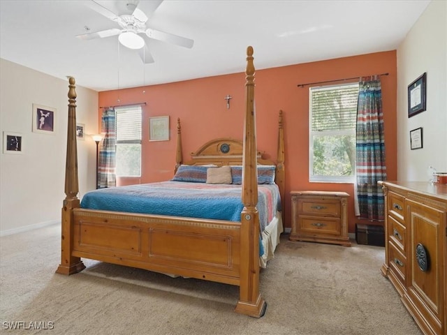 4371 Lazio Way Unit 707, Fort Myers, FL 33901 - bedroom with ceiling fan and light carpet