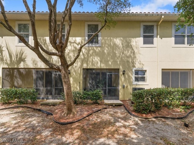 4371 Lazio Way Unit 707, Fort Myers, FL 33901 - back of house featuring stucco siding