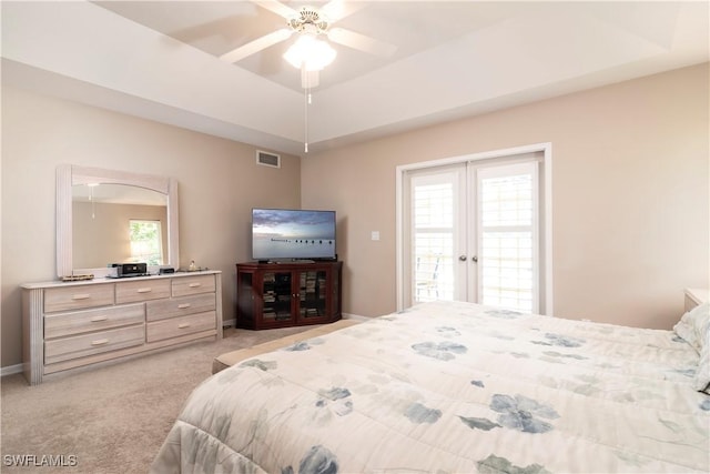 9895 El Greco Cir, Bonita Springs, FL 34135 - bedroom featuring french doors, light carpet, baseboards, and ceiling fan