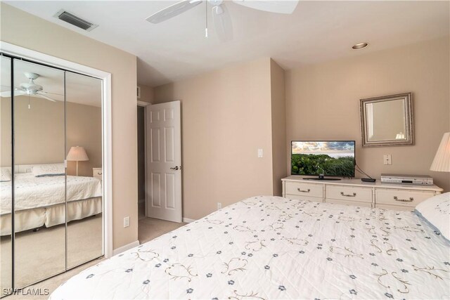 9895 El Greco Cir, Bonita Springs, FL 34135 - bedroom with a closet and ceiling fan