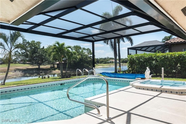 9895 El Greco Cir, Bonita Springs, FL 34135 - swimming pool featuring an in-ground hot tub, a water view, glass enclosure, and a patio area