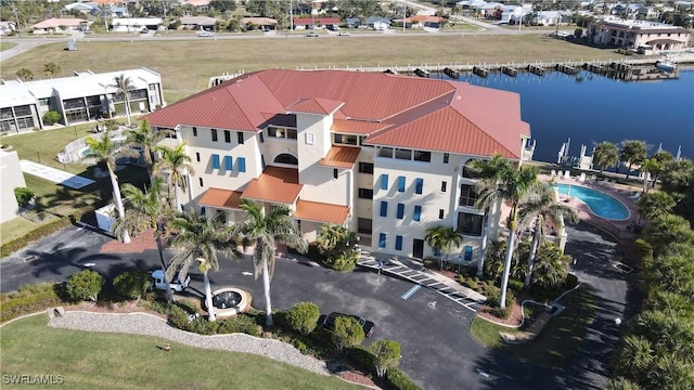 bird's eye view with a water view