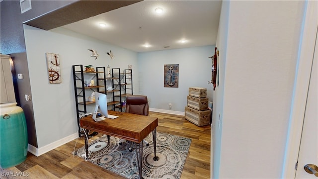 office area featuring baseboards, recessed lighting, wood finished floors, and visible vents