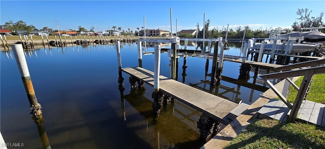 view of dock featuring boat lift and a water view