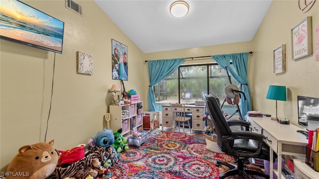 office area with vaulted ceiling and visible vents