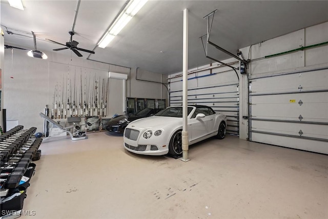 garage featuring a ceiling fan and a garage door opener