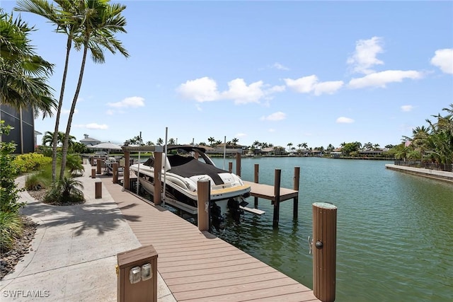 130 Hollyhock Ct, Marco Island, FL 34145 - dock area with a water view and boat lift
