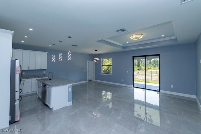 kitchen featuring baseboards, open floor plan, dishwasher, and recessed lighting