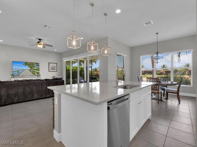 28426 Montecristo Loop, Bonita Springs, FL 34135 - kitchen featuring a sink, dishwasher, a healthy amount of sunlight, and open floor plan