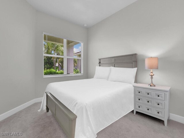 28426 Montecristo Loop, Bonita Springs, FL 34135 - bedroom featuring baseboards and carpet flooring