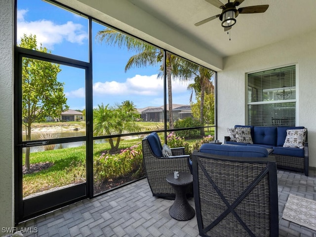 28426 Montecristo Loop, Bonita Springs, FL 34135 - sunroom with a water view, ceiling fan, an outdoor hangout area, and a residential view