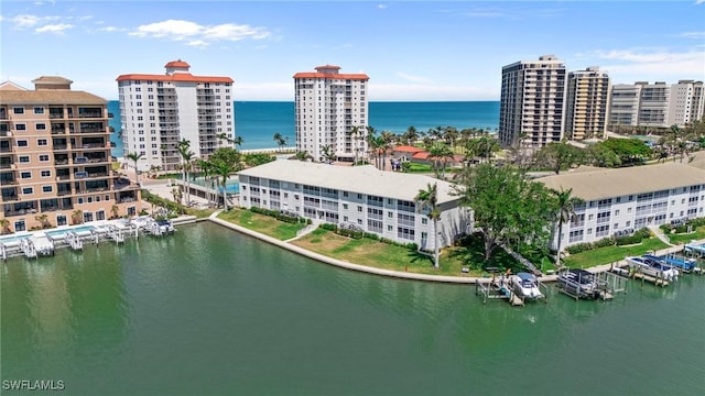 view of urban area featuring a large body of water