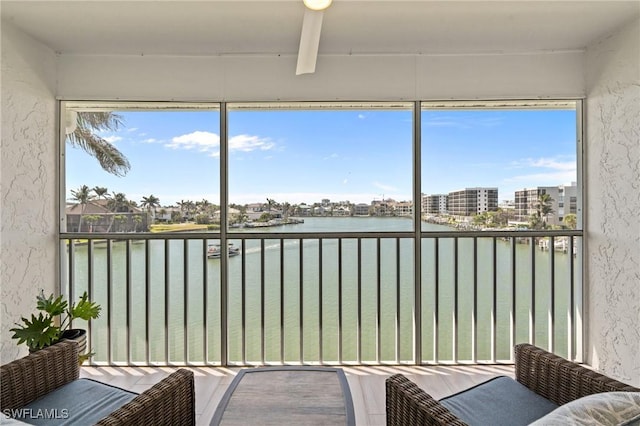 sunroom with a water view