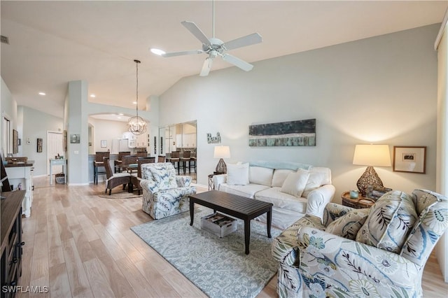 6171 Mandalay Cir Unit 28, Naples, FL 34112 - living room with ceiling fan, arched walkways, vaulted ceiling, light wood-type flooring, and recessed lighting