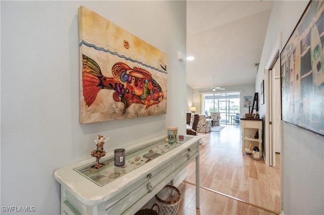 6171 Mandalay Cir Unit 28, Naples, FL 34112 - hall featuring wood finished floors