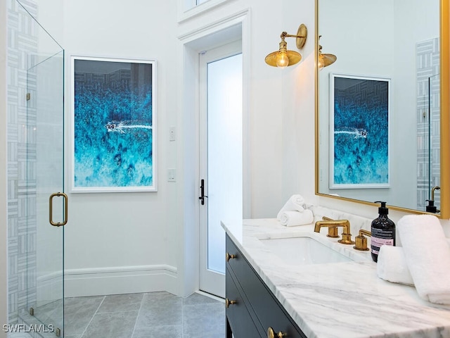 650 Bow Line Dr, Naples, FL 34103 - bathroom featuring vanity, a stall shower, tile patterned floors, and plenty of natural light